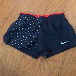 Navy & red Nike running shorts with white stars M